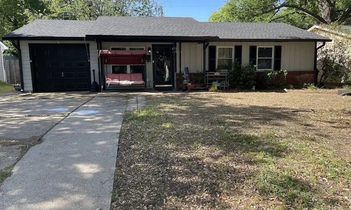 Asphalt Shingle Roof Repair crew at work on a residential roof in Anderson Creek
